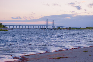 Wall Mural - Oresund bridge between Denmark and Sweden seen in sunset from the Swedish side