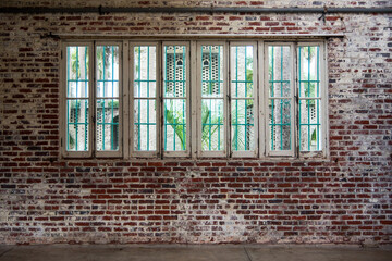 Canvas Print - View of the old brick wall with long windows in Hunnington State Park, South Carolina, USA