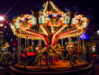 Lit carousel on Tivoli in Denmark at christmas time