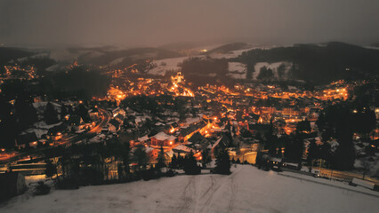 Canvas Print - Mesmerizing shot of an old town during winter at night