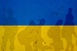 Leinwandbild Motiv Ukraine flag on wall and shadows of soldier and refugees leaving. Ukraine war concept