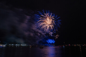 Sticker - View of huge colorful British firework championships at Plymouth, Devon against the night sky