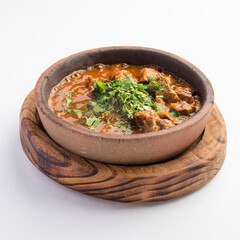 Wall Mural - Gourmet meat stew dish isolated on a white background