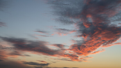 Wall Mural - Beautiful view of colorful clouds in the sky at the fiery sunset