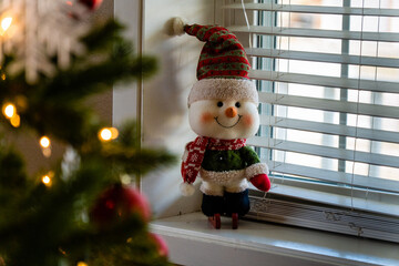 Sticker - Closeup of indoor Christmas decorations Snowman