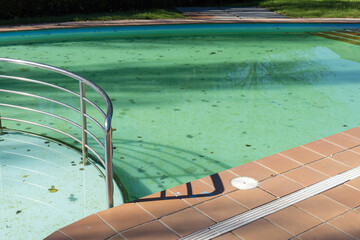 Closeup of a dirty swimming pool background