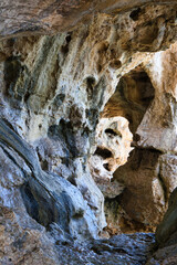 Canvas Print - Closeup of a cave in the daylight