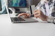 © Mihail - online purchase of products from home using credit card, making payment