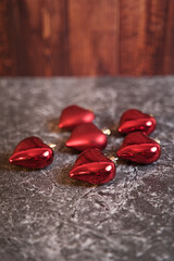 Poster - Closeup of red heart shaped decorations