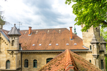 Canvas Print - Closeup of a brick building roof in Germany