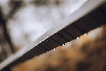 Wall Mural - Closeup of a pipe with raindrops on it