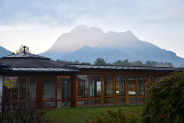 Poster - Closeup of a temple with mountains on the background