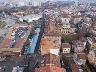 Canvas Print - Aerial view of old residential buildings and a cityscape