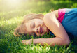© Nicola K/peopleimages.com - Girls just want to have fun. Shot of a little girl having fun on the lawn.