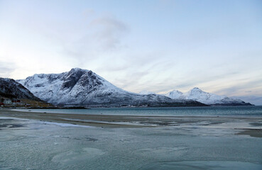 Wall Mural - Stunning view of snowy mountains in Grotfjord, Norway