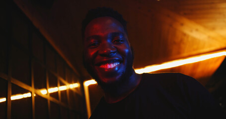 Wall Mural - Portrait of an African American male at a night club