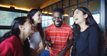 Wall Mural - Group of South Asian friends laughing together - friendship concept