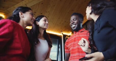 Wall Mural - Group of South Asian friends laughing together - friendship concept