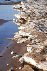 Sticker - Vertical photo of salt rock formation on a sea shore