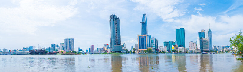 Bitexco Financial Tower, skyscraper viewed from below toward a sky. Urban development with modern architecture