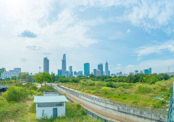 Wall Mural - Beautiful landscape of Ho Chi Minh city or Sai Gon, Vietnam. Bitexco Financial Tower and skyscraper buildings. Business and landscape concept.