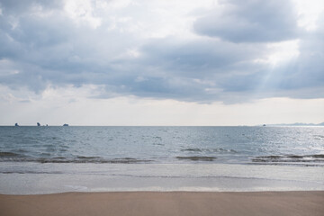 Wall Mural - Landscape image of tropical white beach with blue sea and sky background