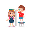 © Colorfuel Studio - boy and girl measure height for grow progress