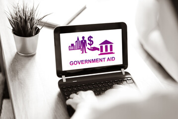 Canvas Print - Government aid concept on a laptop screen