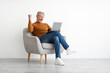 © Prostock-studio - Mature man using laptop celebrating success shaking fists