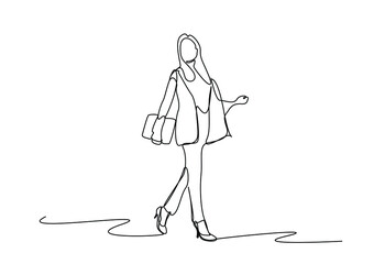 Wall Mural - businesswoman walking cheerfully with files in her hands in the office