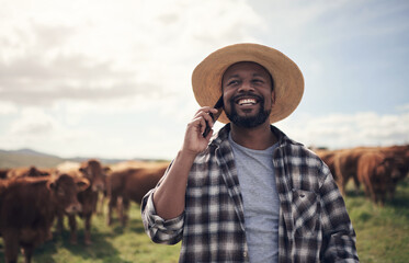 Poster - call him for the best cattle in agribusiness. shot of a mature man using a smartphone while working 