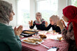 © Jasmin Merdan - Muslim family and friends gathering together at home for eating dinner. High quality photo
