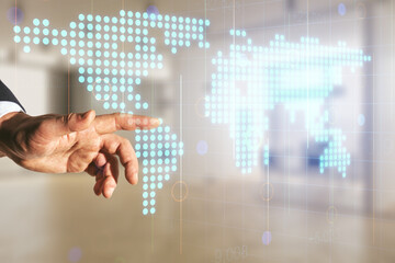 Poster - Man hand clicks on abstract creative digital world map on blurred office background, globalization concept. Multiexposure