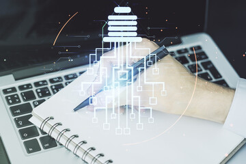 Poster - Double exposure of creative light bulb hologram with chip and hand writing in notebook on background with laptop, idea and brainstorming concept