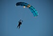© SuperStock - Parachute Flying Against Blue Sky in Locarno, Switzerland.