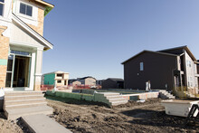 Houses And Concrete Foundation In New Housing Development