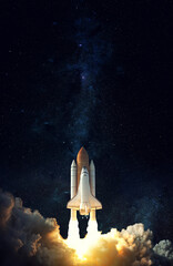 Wall Mural - space shuttle takes off into space. elements of this image furnished by nasa.