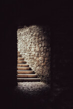 Light On Stone Stairs In A Dark Basement