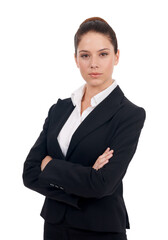 Canvas Print - Portrait of a strong business professional. Studio portrait of a confident-looking young business woman with her arms folded isolated on white.