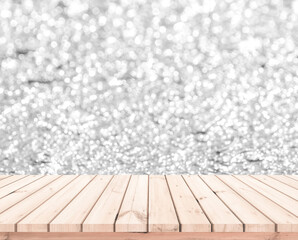 Wall Mural - Wood table or wood floor with abstract white bokeh background for product display