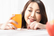 © Shutter B - Healthy lifestyle, Close up beautiful young asian woman with fruit juice smiling happy. Healthy eating, Food and lifestyle, Health, Beauty, Dieting concept.