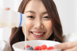 © Shutter B - Healthy lifestyle, Close up beautiful young asian woman with fruit milk smiling happy. Healthy eating, Food and lifestyle, Health, Beauty, Dieting concept.