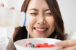 © Shutter B - Healthy lifestyle, Close up beautiful young asian woman with fruit milk smiling happy. Healthy eating, Food and lifestyle, Health, Beauty, Dieting concept.