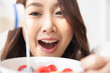 © Shutter B - Healthy lifestyle, Close up beautiful young asian woman with fruit milk smiling happy. Healthy eating, Food and lifestyle, Health, Beauty, Dieting concept.
