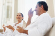 © Nicola Katie/peopleimages.com - Thorough enjoyment on our spa day. Shot of a loving mature couple enjoying a drink while relaxing together at a day spa.