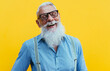 © oneinchpunch - Cool Senior hipster man with stylish beard. Modern business man urban portraits outdoor. Conceptual  representation of aging as a state of mind