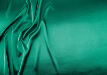 Wall Mural - Green satin fabric as background