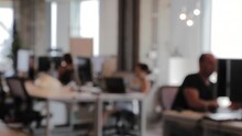 Blurry Background Of People Working In An Office, Business Incubator And Start Up Concept
