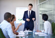 © T Hover/peopleimages.com - You make a valid point. Shot of a businessman presenting data during a boardroom meeting.