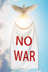 Leinwandbilder - White Dove holding White flag  and Red No War Wordl on flag Flying on blue sky for independence , freedom ,Pray for Ukraine and No war concept